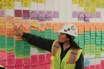 Simone going over the details of a recent construction pull-plan.